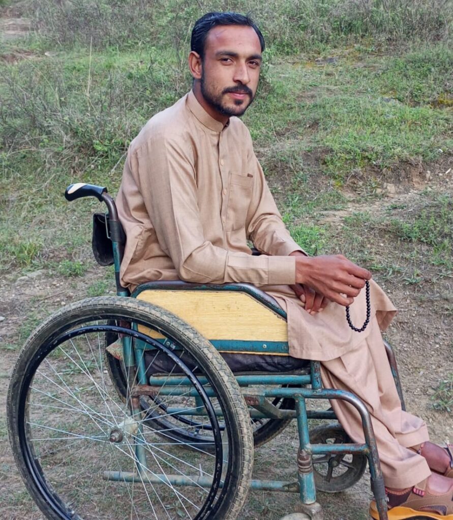 Man sitting in a wheelchair.